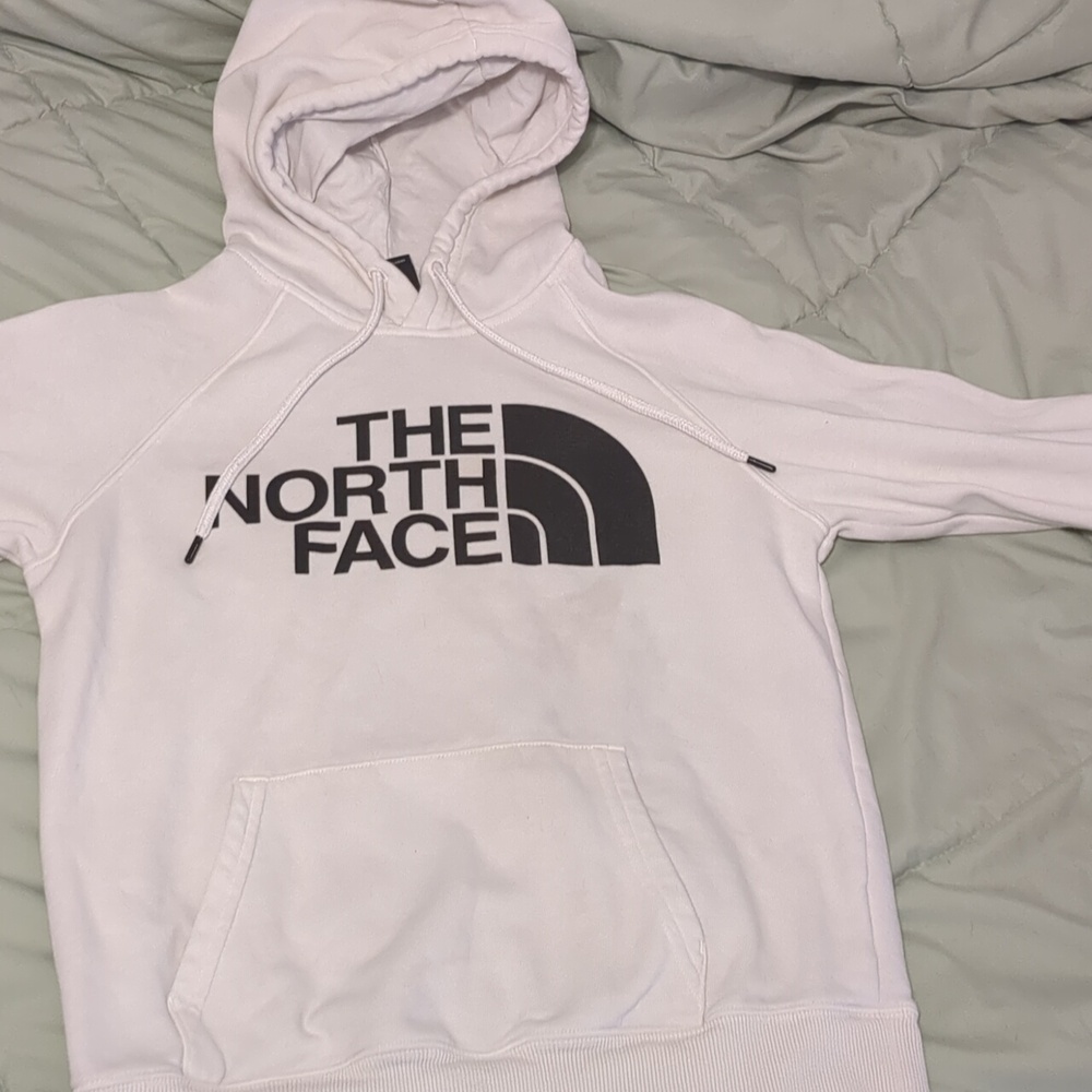 A North Face white hoodie, size xs.